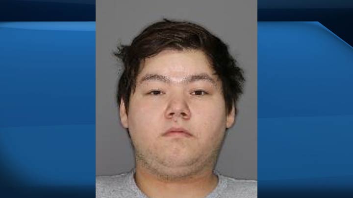 Saskatoon police say Alexander Tokaryk, who is facing child luring and drug trafficking charges, has turned himself in.