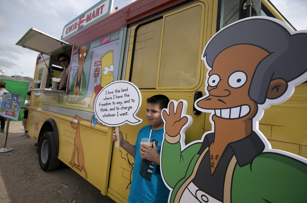 In this March 15, 2015 file photo, an Apu cutout is displayed at a 'Simpsons' Kwik-E-Mart Truck in Austin, Texas. 