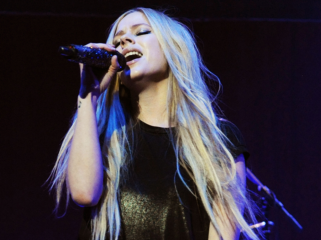 Avril Lavigne performs during the 2013 Star ’94 Jingle Jam at the Gwinnett Center on Dec. 16, 2013, in Duluth, Ga.