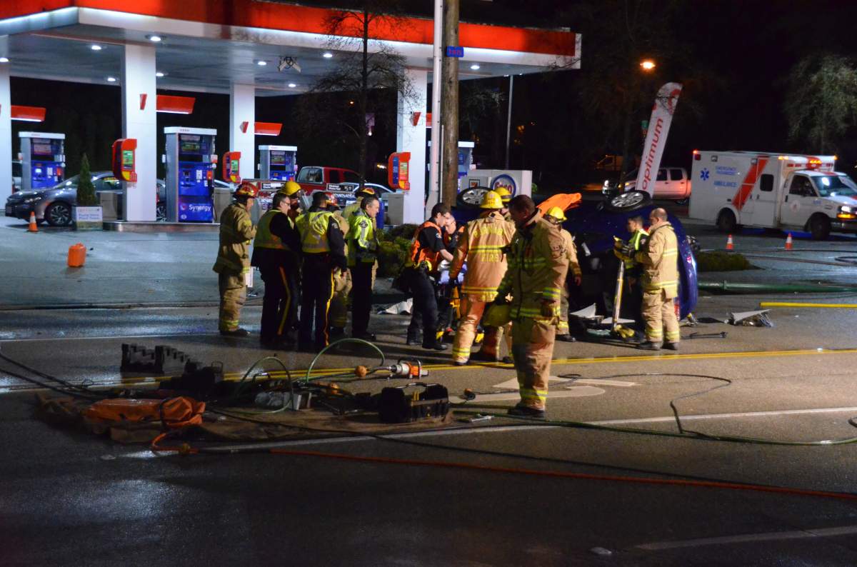 Vehicle flips over on Canada Way - image