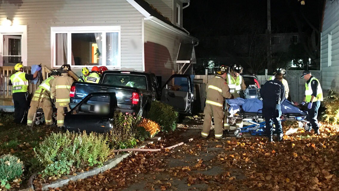 A photo from 2016 shows the aftermath of a pickup truck crashing into a Vanier home. On Sunday, a vehicle struck the same home after a police chase.