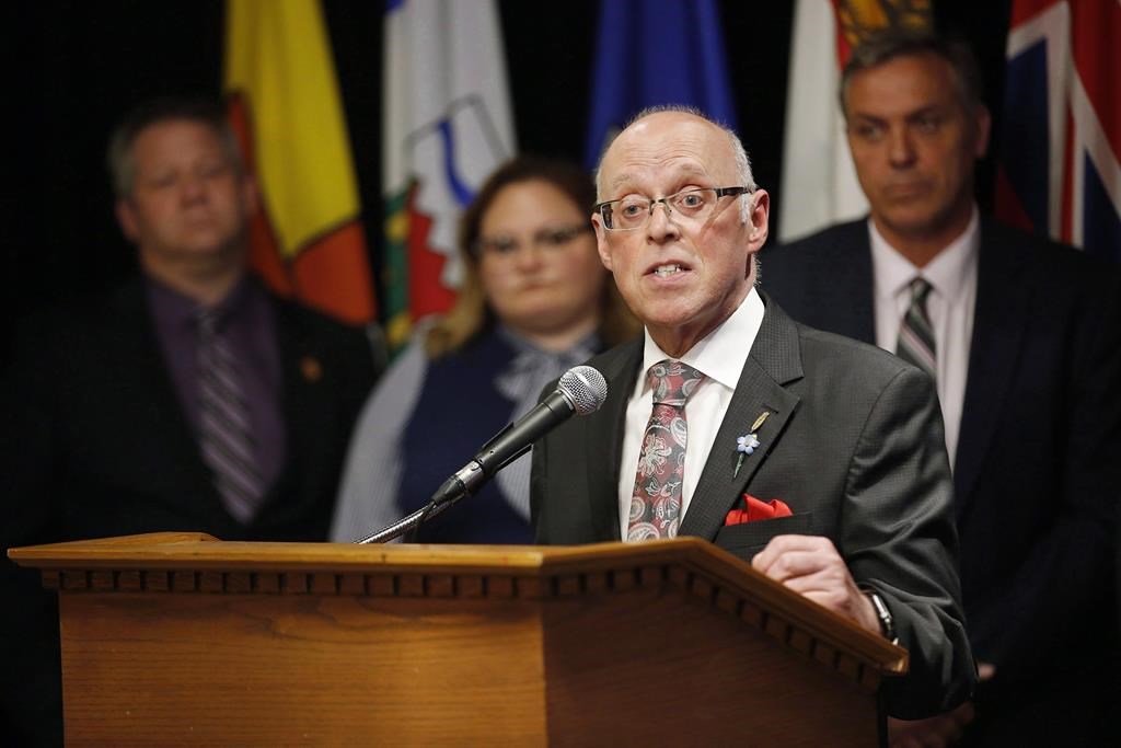 John Haggie, Newfoundland and Labrador Minister of Health and Community Services responds to a reporter's questions at a press conference during the Conferences of Provincial-Territorial Ministers of Health in Winnipeg on June 28, 2018.