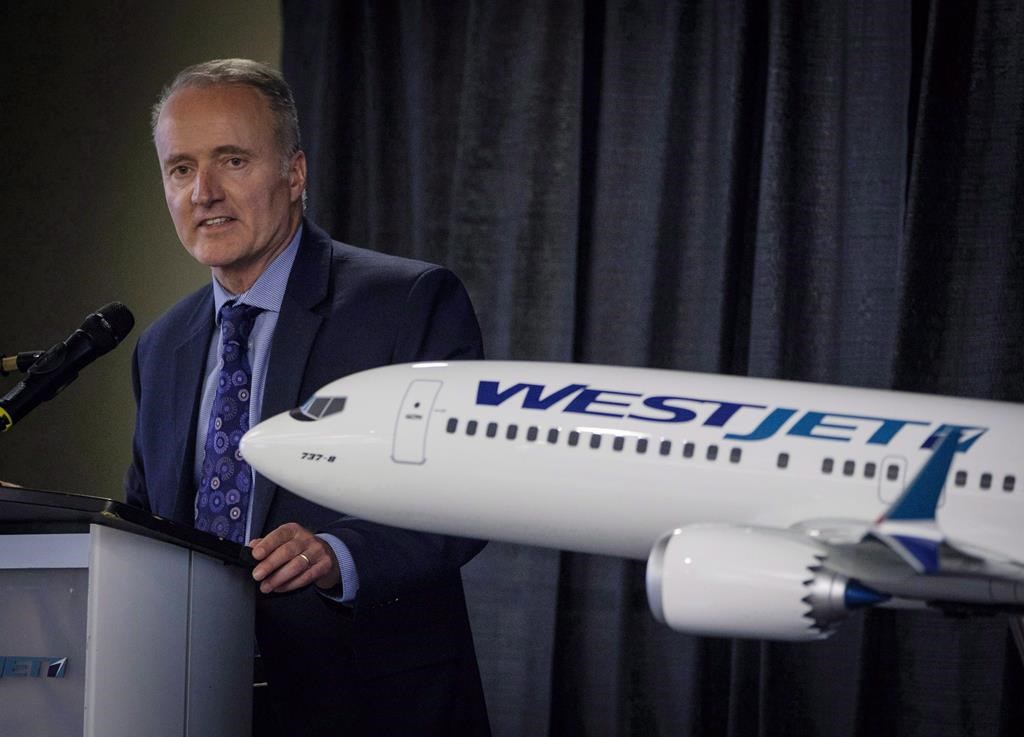 WestJet president and CEO Ed Sims addresses the airline's annual meeting in Calgary, Tuesday, May 8, 2018.