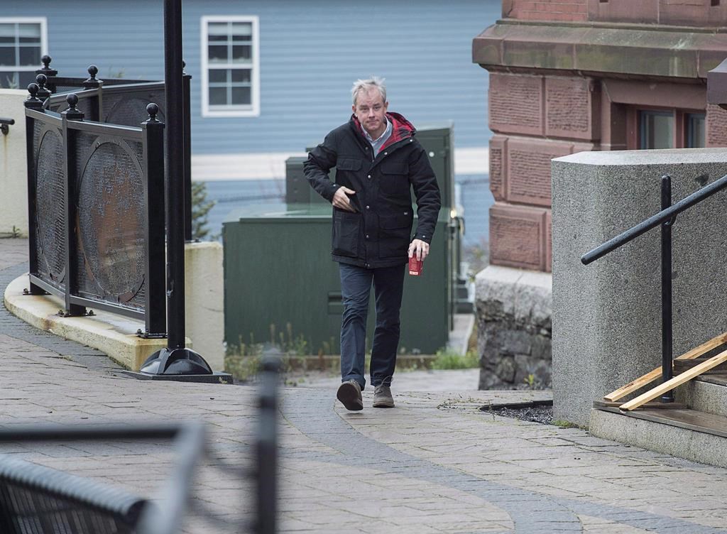 Dennis Oland walks to the Law Courts in Saint John, N.B., on Tuesday, Nov. 6, 2018.