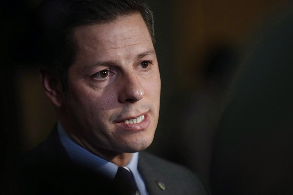 Winnipeg mayor Brian Bowman speaks to media after the reading of the throne speech at the Manitoba Legislature in Winnipeg on November 20, 2018. THE CANADIAN PRESS/John Woods.