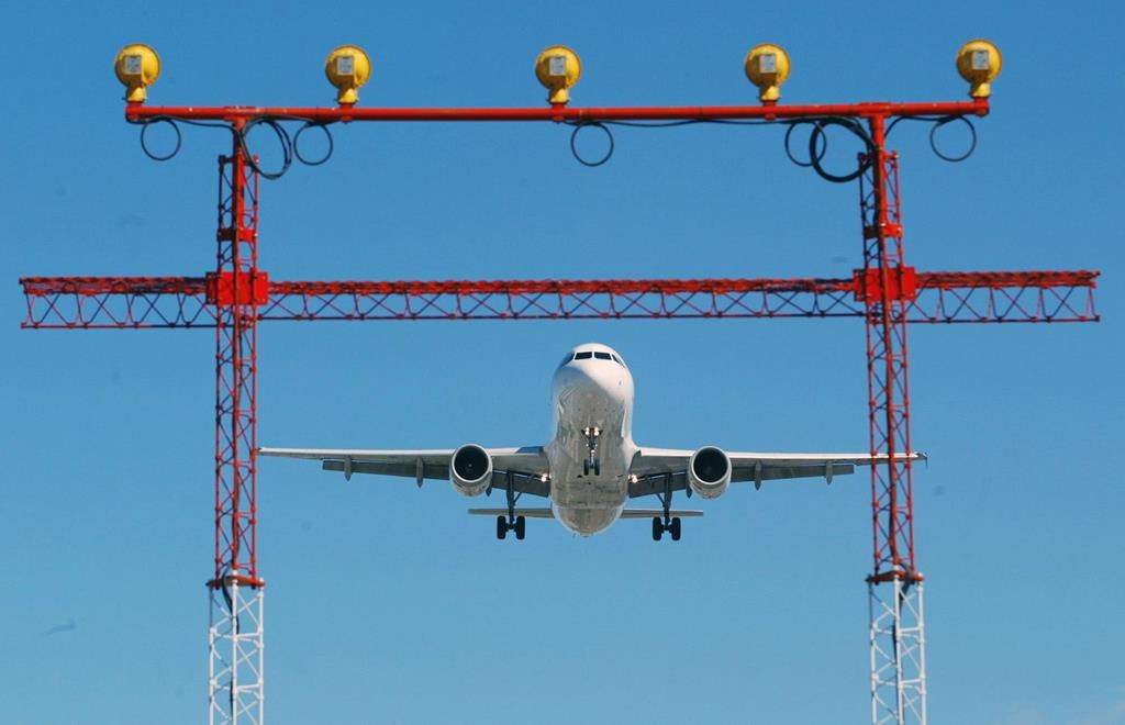 An Air Canada jet prepares to land at Pearson International Airport in Toronto.