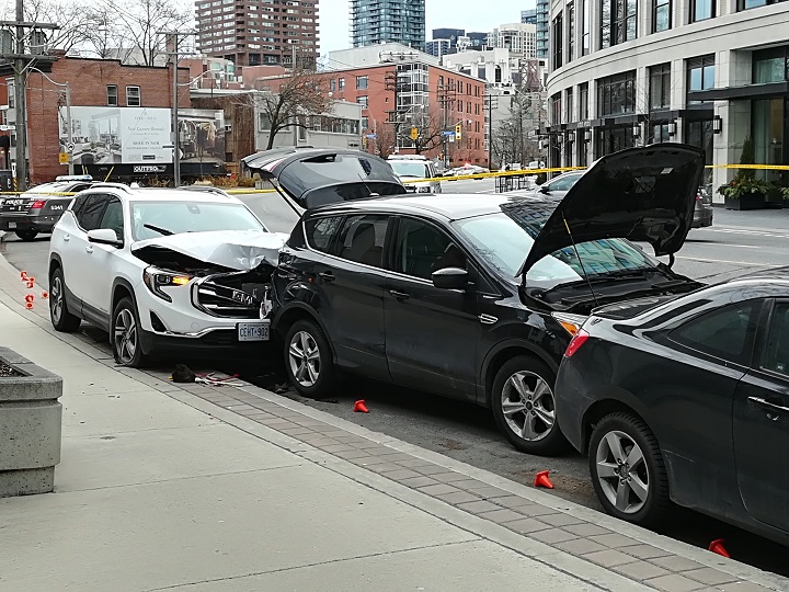 Toronto police are investigating after a collision in Yorkville on Saturday left one woman dead and two others injured.