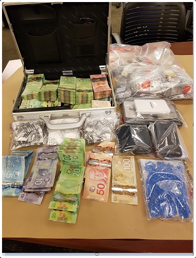 London police seized over $50,000 in cash and drugs during a search of a home on Gladman Avenue on Wednesday, Dec. 19, 2018. 