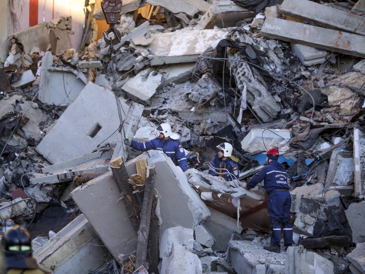 Emergency Situations employees working at the scene of a collapsed apartment building in Magnitogorsk, Russia, Monday, Dec. 31, 2018.