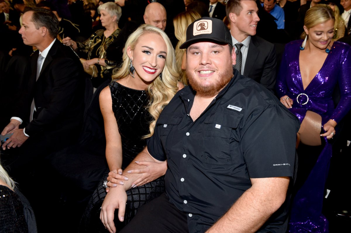 NASHVILLE, TN - NOVEMBER 14:  (INSIDE ACCESS - FOR EDITORIAL USE ONLY) Singer-songwriter Luke Combs (R) and Nicole Hocking attend the 52nd annual CMA Awards at the Bridgestone Arena on November 14, 2018 in Nashville, Tennessee.  (Photo by John Shearer/Getty Images for the Country Music Association).