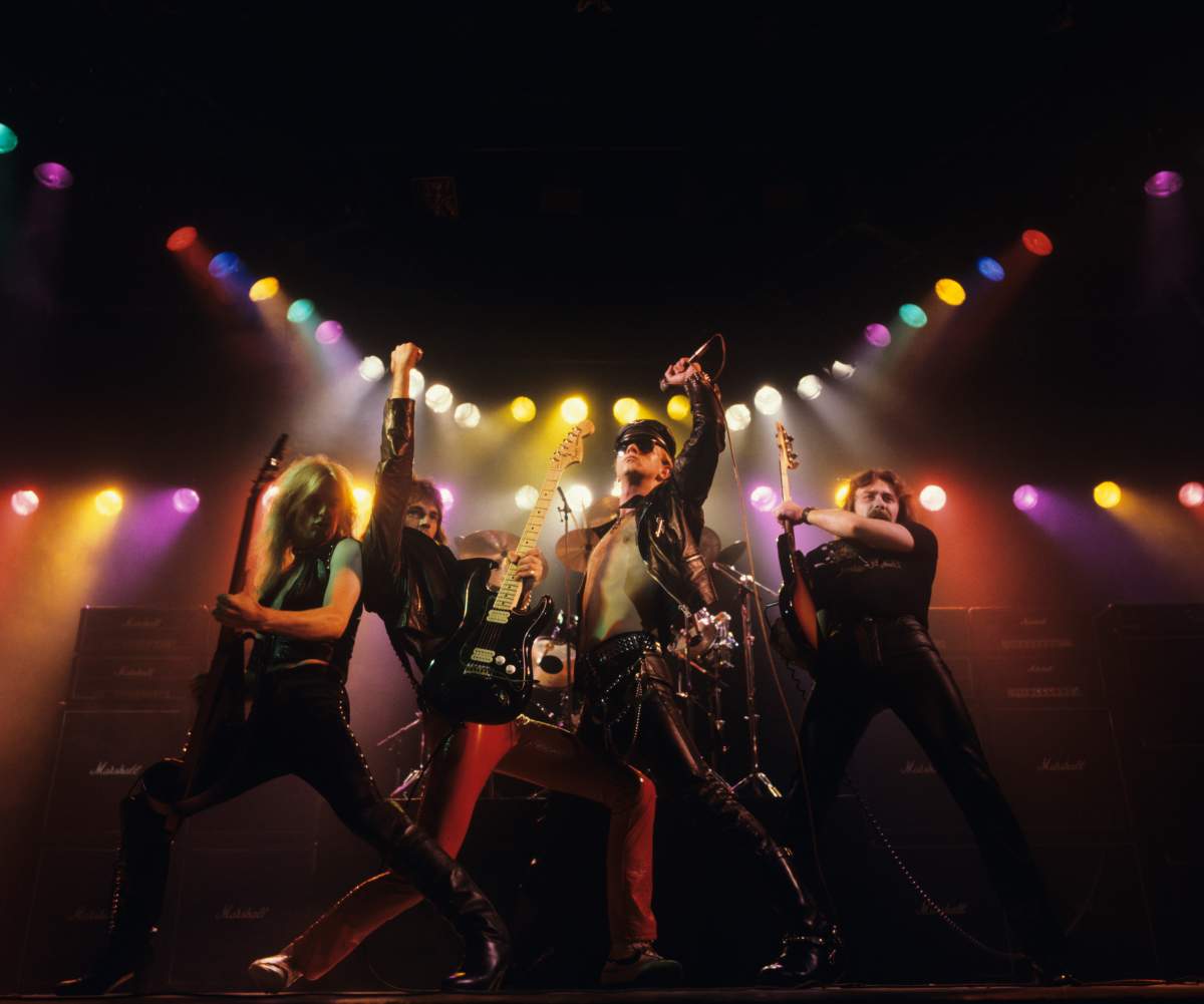 (L-R) K.K. Downing, Glenn Tipton, Rob Halford and Ian Hill of Judas Priest perform onstage — ‘Unleashed In The East’ album cover session taken on July 1, 1979.