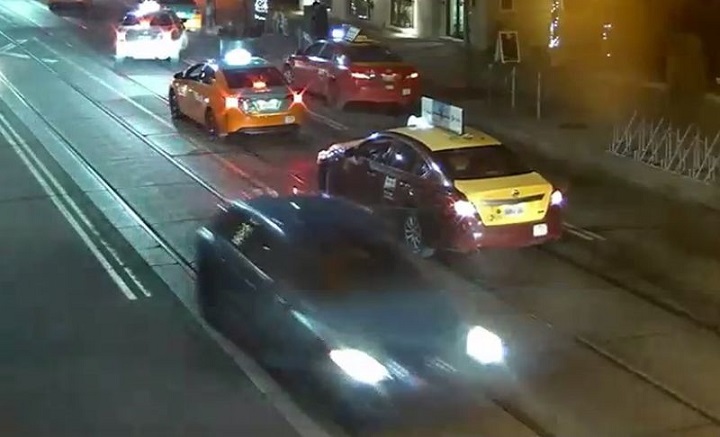 Toronto police release surveillance image of the suspect car fleeing the area after a fatal shooting in downtown Toronto. 