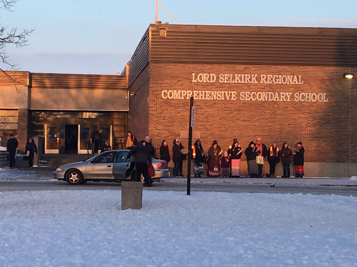 The Bear Clan on school grounds Tuesday.