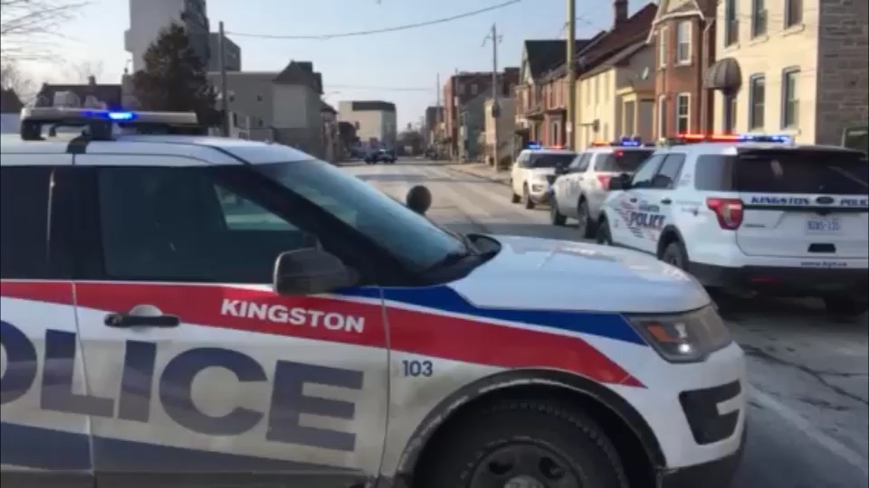 Kingston police arrested two men after they allegedly tried to rob and man, and stabbed him Monday evening.