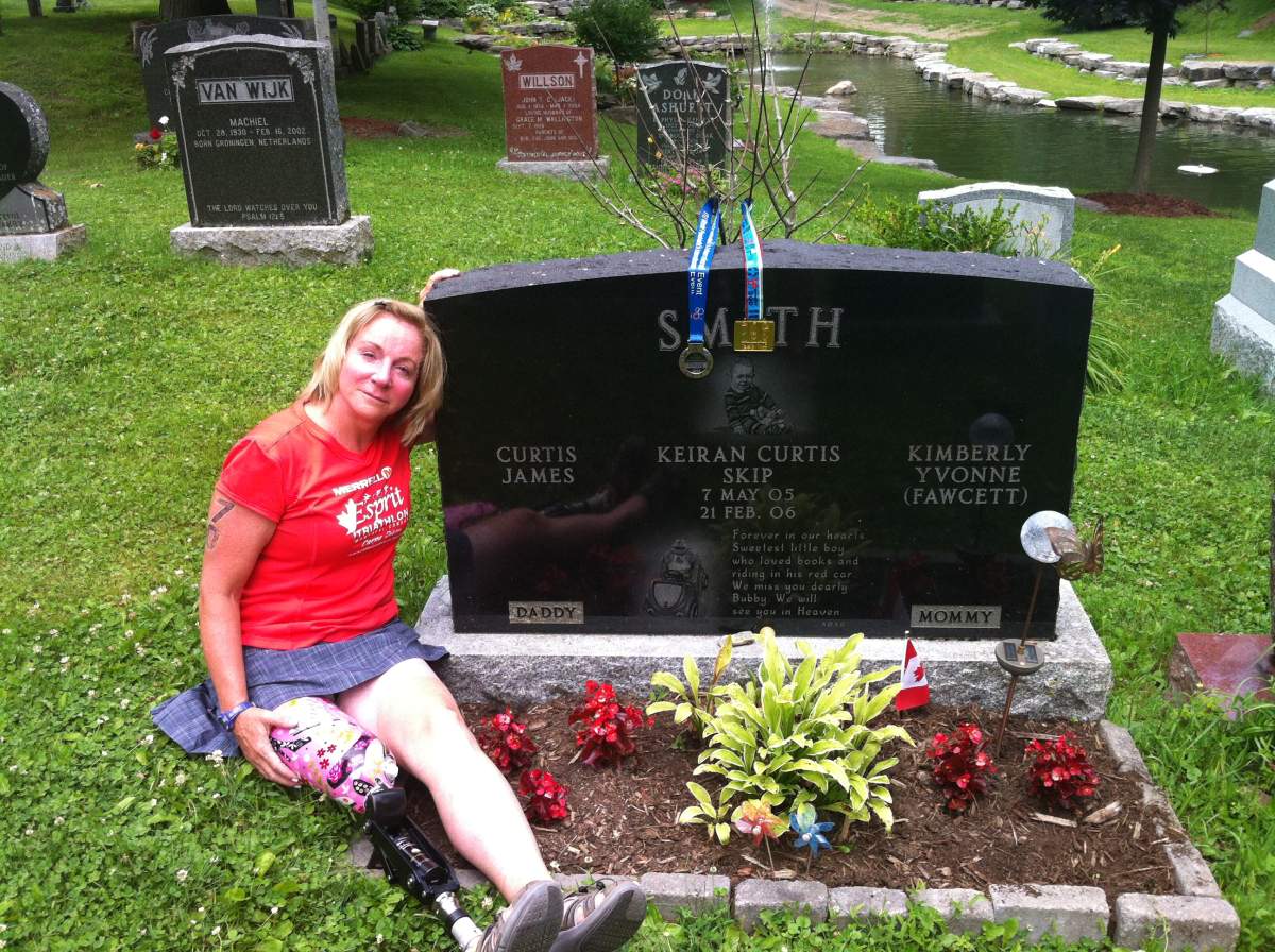 Capt. Kimberly Fawcett at the grave of her son, Keiran.