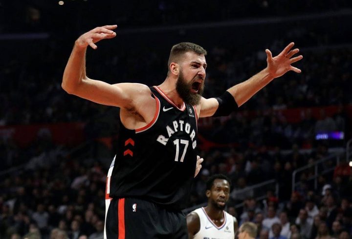 Toronto Raptors' Jonas Valanciunas (17) reacts after scoring against the Los Angeles Clippers during the first half of an NBA basketball game, Tuesday, Dec. 11, 2018, in Los Angeles.