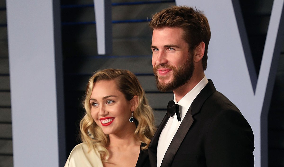 Miley Cyrus and Liam Hemsworth attend the 2018 Vanity Fair Oscar Party on March 4, 2018 in Beverly Hills, Calif.