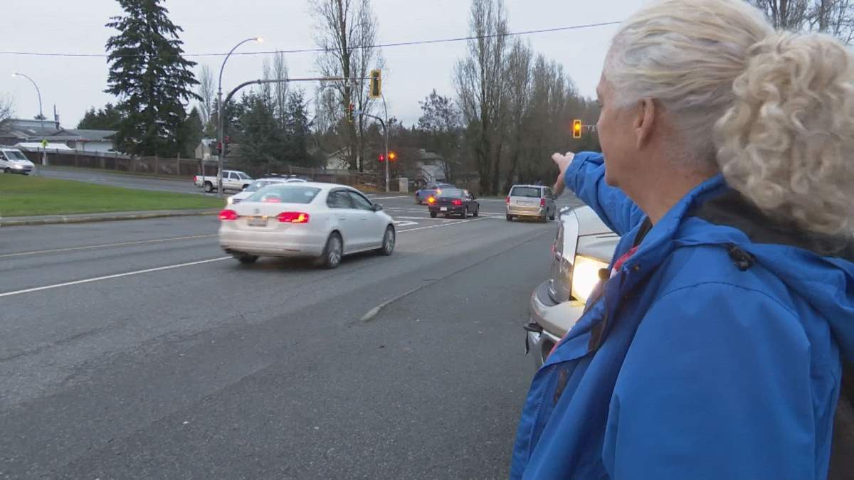 Someone stole Anne Marie Behan's phone while she was cradling the neck of a crash victim. 