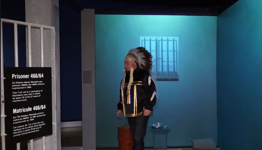 Derek Nepinak examines a replica of Nelson Mandela’s cell before starting his 27-hour hunger strike.