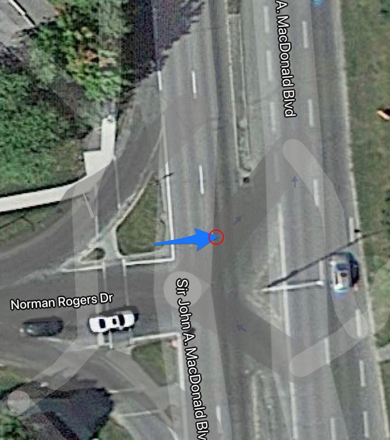 An aerial view of the intersection at Norman Rogers Drive and Sir John A. MacDonald Boulevard shows the direction in which the pedestrian was travelling when she was hit.
