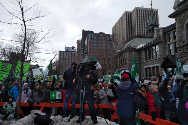 Thousands gathered in Ottawa to protest cuts to French-language services in Ontario on Saturday, Dec. 1, 2018.