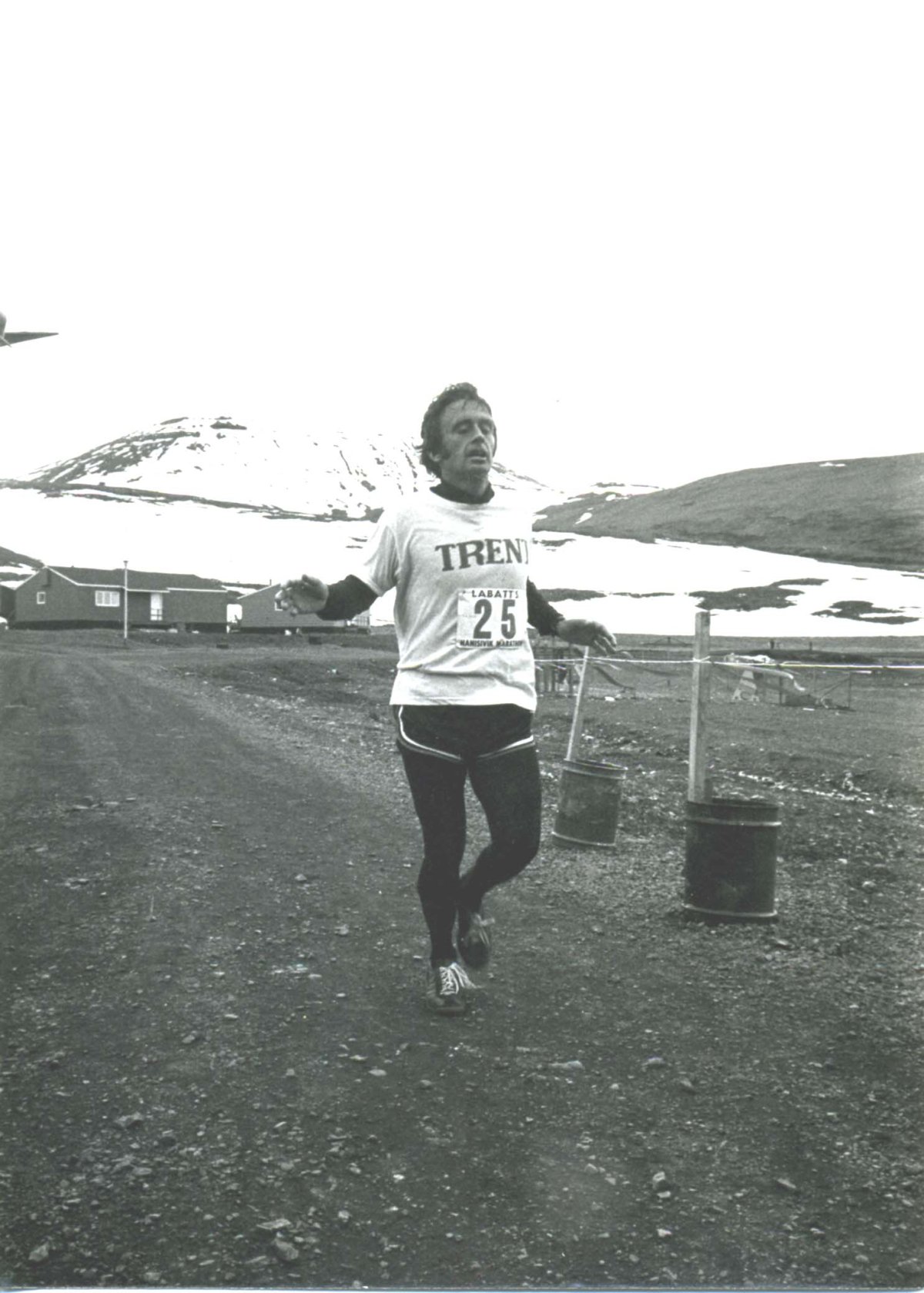 Peter Adams, seen finishing the Arctic Marathon in 1979. The YMCA annual winter run has been renamed the "Peter Adams Winter Run.".