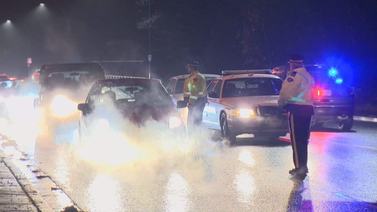 Police in British Columbia perform road checks. 