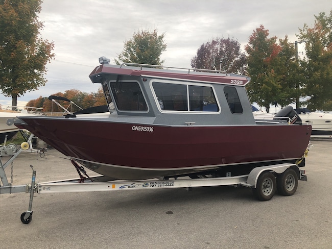 Police are investigating after a boat, trailer and motor were reported stolen from a marina in Springwater Township.