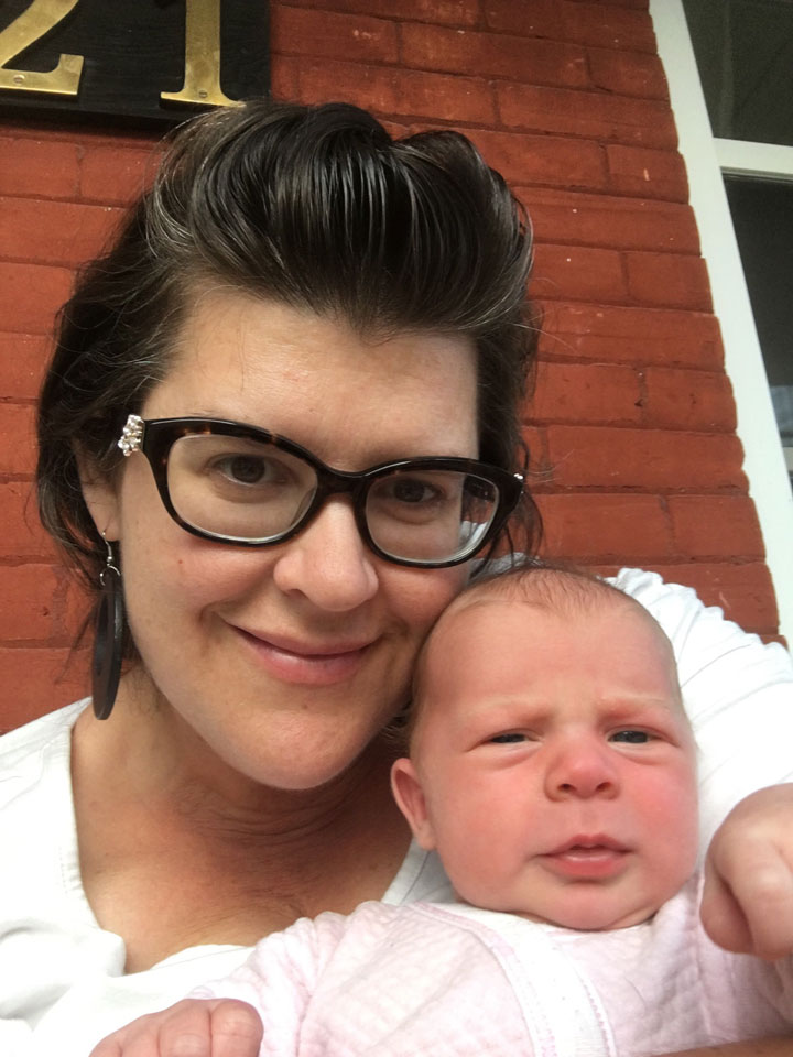 Tara Hills pictured with one of her children.