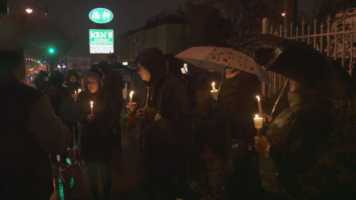 Crowds gather to remember Donnell Auger, who was killed by a hit-and-run driver on Thursday morning. 