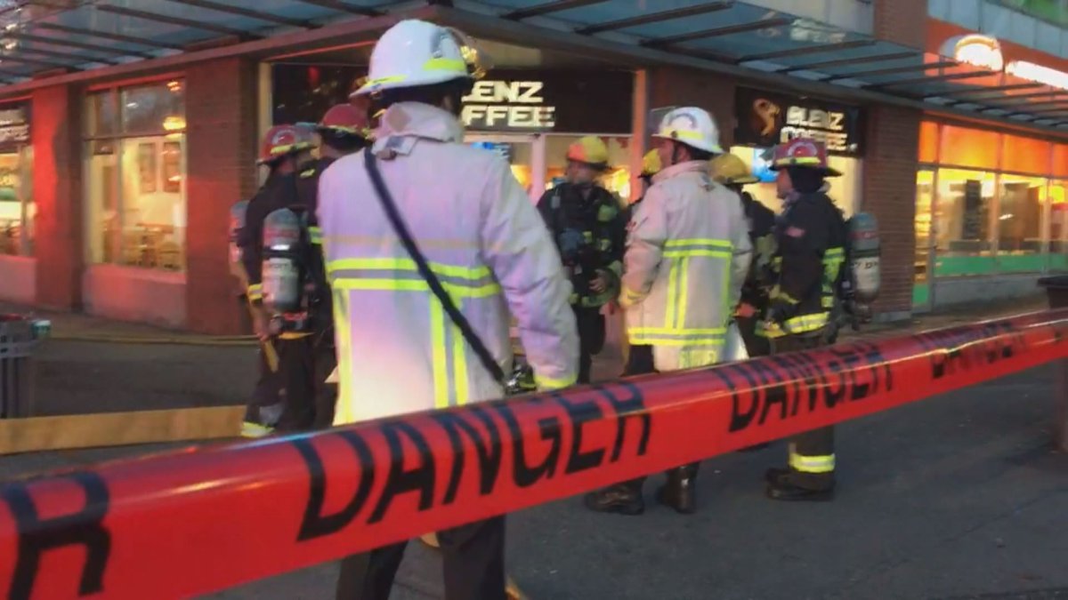 Crews taped off retail outlets as the extinguished a fire at the Commercial Broadway SkyTrain station. 