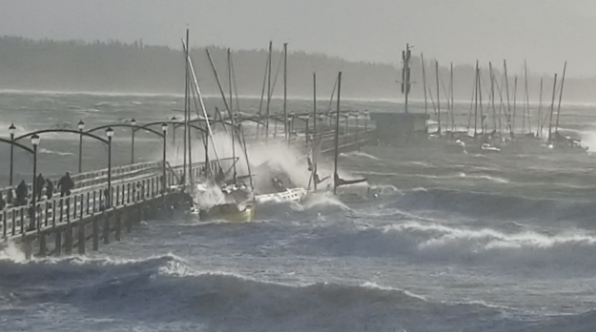 Sailboats slam into the White Rock pier during a wind storm on Thursday, Dec. 20. 