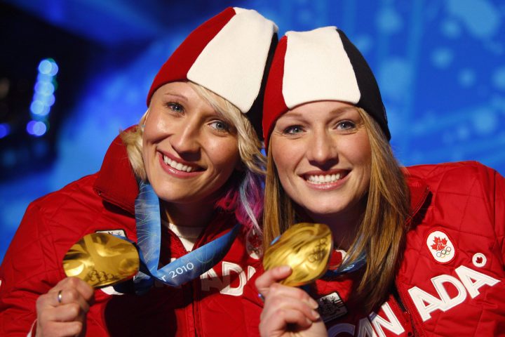 Canadian bobsleigh gold medalists Kaillie Humphries, left, and Heather Moyse pose with their medals at the awards ceremony on Thursday, Feb. 25, 2010, at the Whistler Olympic Park during the Winter Olympic Games.