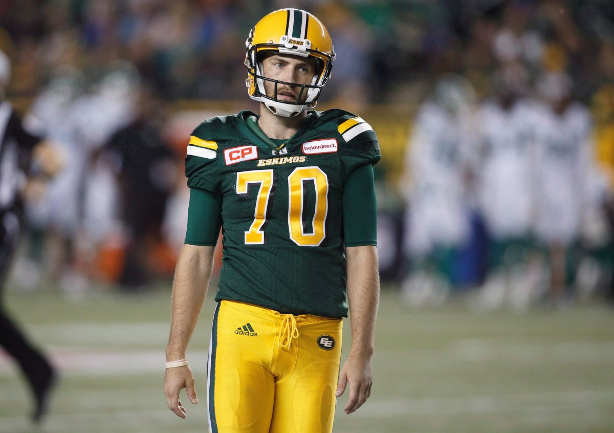 Edmonton Eskimos' Hugh O'Neill (70) reacts to a play against the Saskatchewan Roughriders during second half CFL action in Edmonton, Alta., on Friday August 25, 2017. 