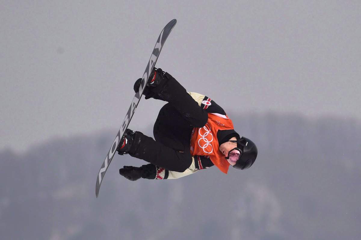 Canada's Max Parrot of Bromont, Que. flies through the air during his second run in the men's snowboard slopestyle qualification at the Phoenix Snow Park at the 2018 Winter Olympic Games in Pyeongchang, South Korea, Saturday, Feb. 10, 2018.