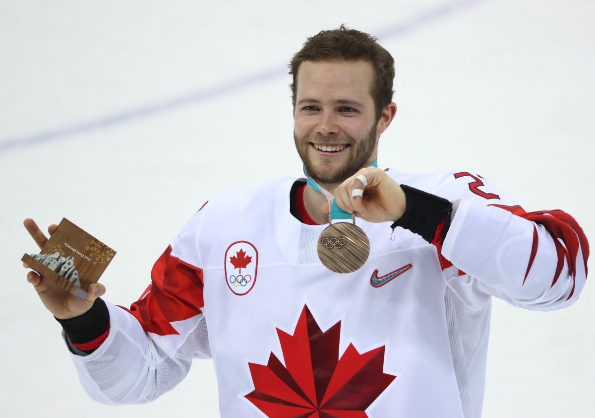 Canada's Cody Goloubef shows his bronze medal after winning the men's bronze medal ice hockey game between the Czech Republic and Canada at the 2018 Winter Olympic Games. The Ottawa Senators acquired Goloubef from the Boston Bruins in exchange for forward Paul Carey on Friday, Jan. 11, 2019.