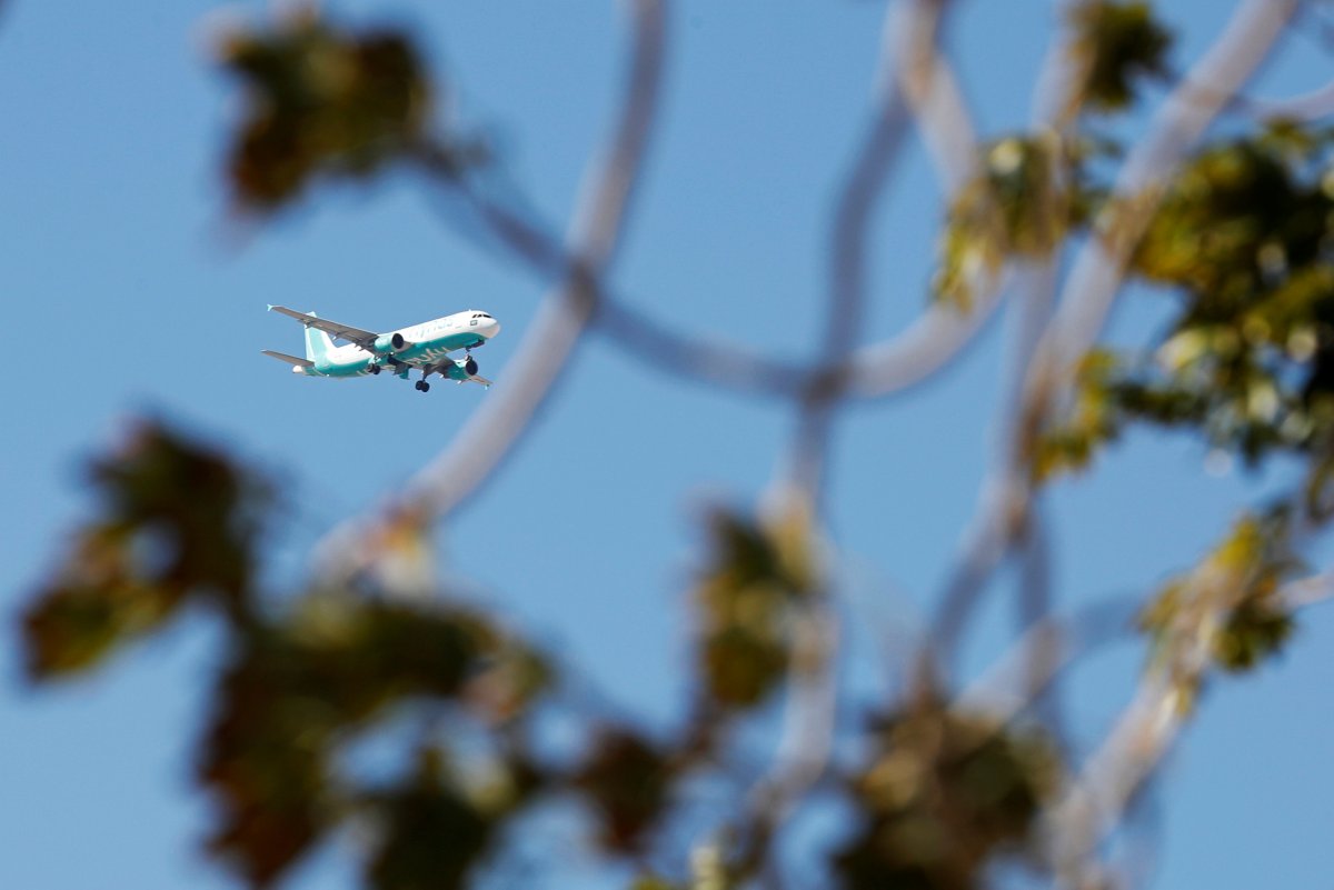 A Saudi budget airline Flynas plane flies over the Red Sea resort of Sharm el-Sheikh, south of Cairo, Egypt December 15, 2018. Picture taken December 15, 2018. 