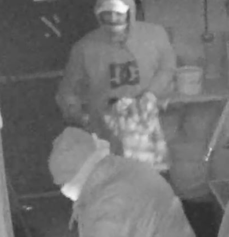 Police are seeking to identify two suspects in connection with a break-in at a restaurant in Angus.