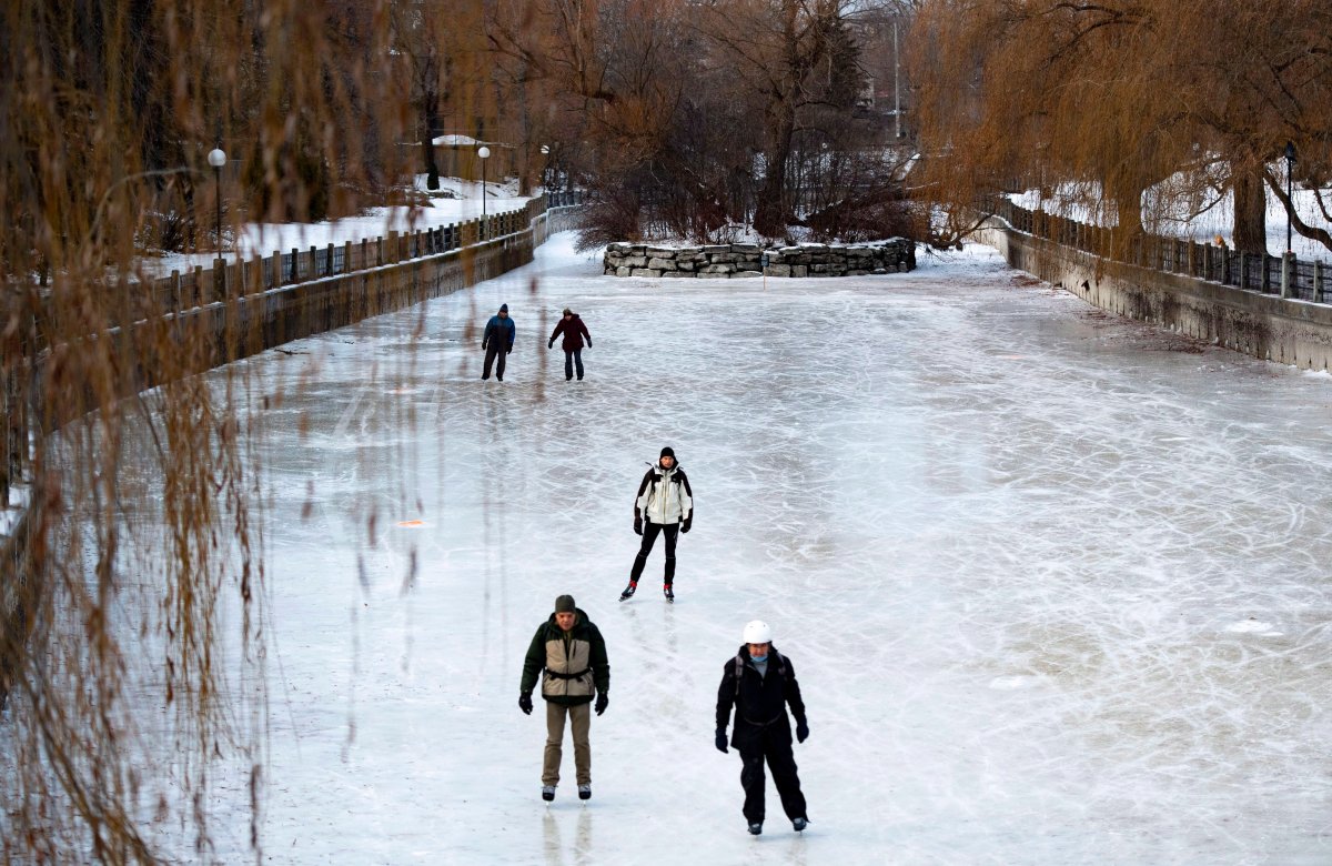 People skate at Paterson Creek on the Rideau Canal Skateway on its opening day, in Ottawa on Sunday, Dec. 30, 2018.