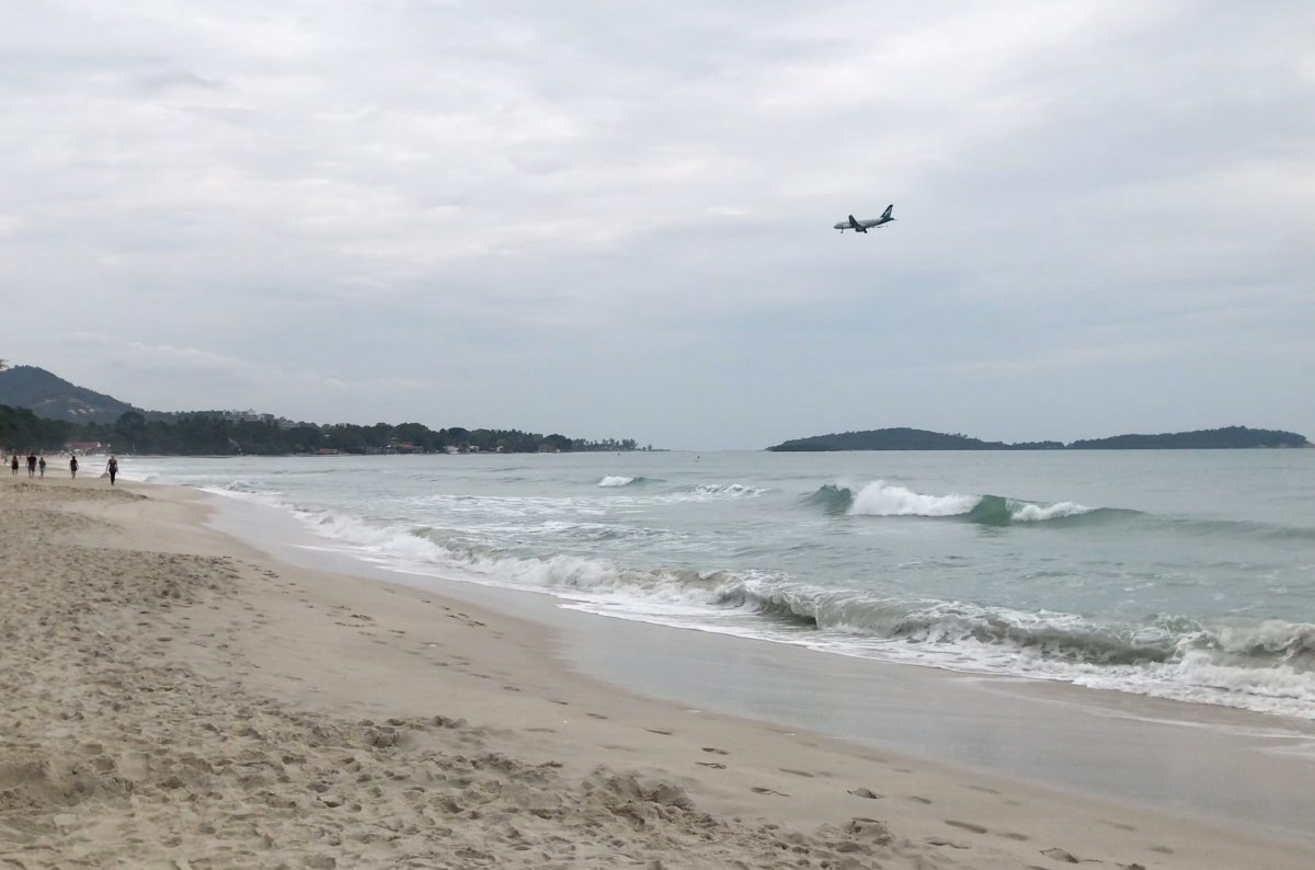 A passenger airplane flies over a beach at the tourist destination of Koh Samui Island, Surat Thani province, southern Thailand, 03 January 2019. 