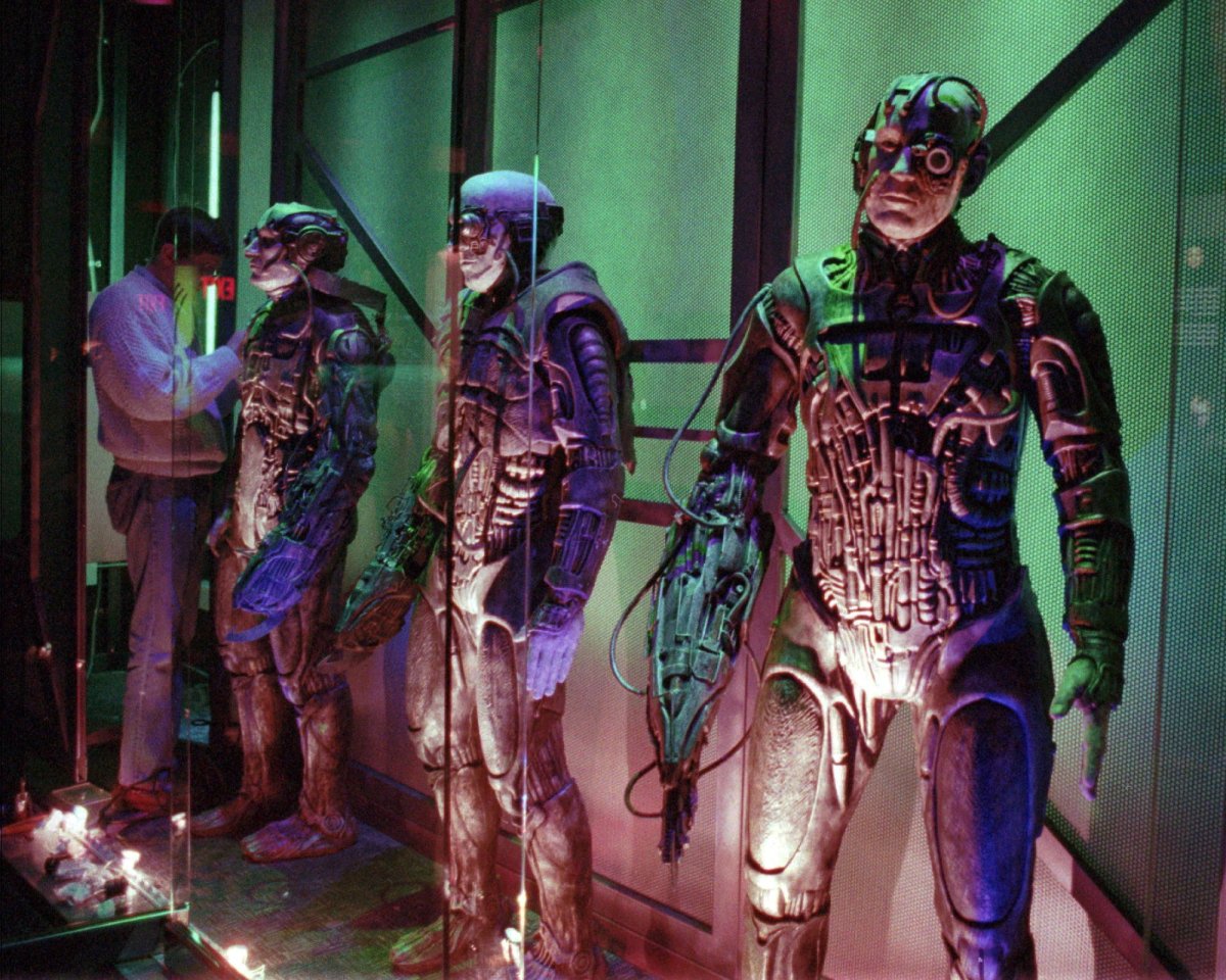 A worker puts the finishing touches on a display of Borgs, which lines the walls at Star Trek: The Experience, at the Las Vegas Hilton, Friday, Jan. 2, 1998, in Las Vegas.
