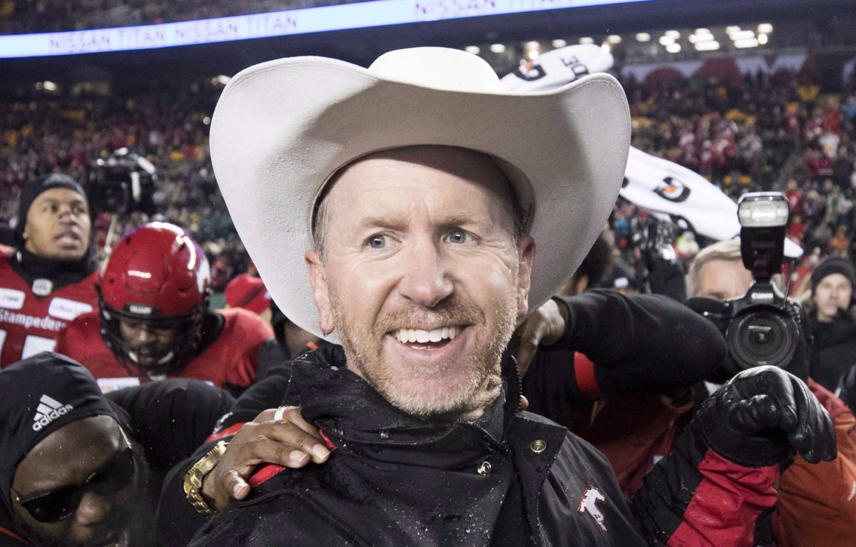 Calgary Stampeders head coach Dave Dickenson celebrates his team's win over the Ottawa Redblacks in the 106th Grey Cup in Edmonton, Alta. Sunday, Nov. 25, 2018. Change is inevitable in pro sport, but Dickenson has never seen an off-season quite like this one. 