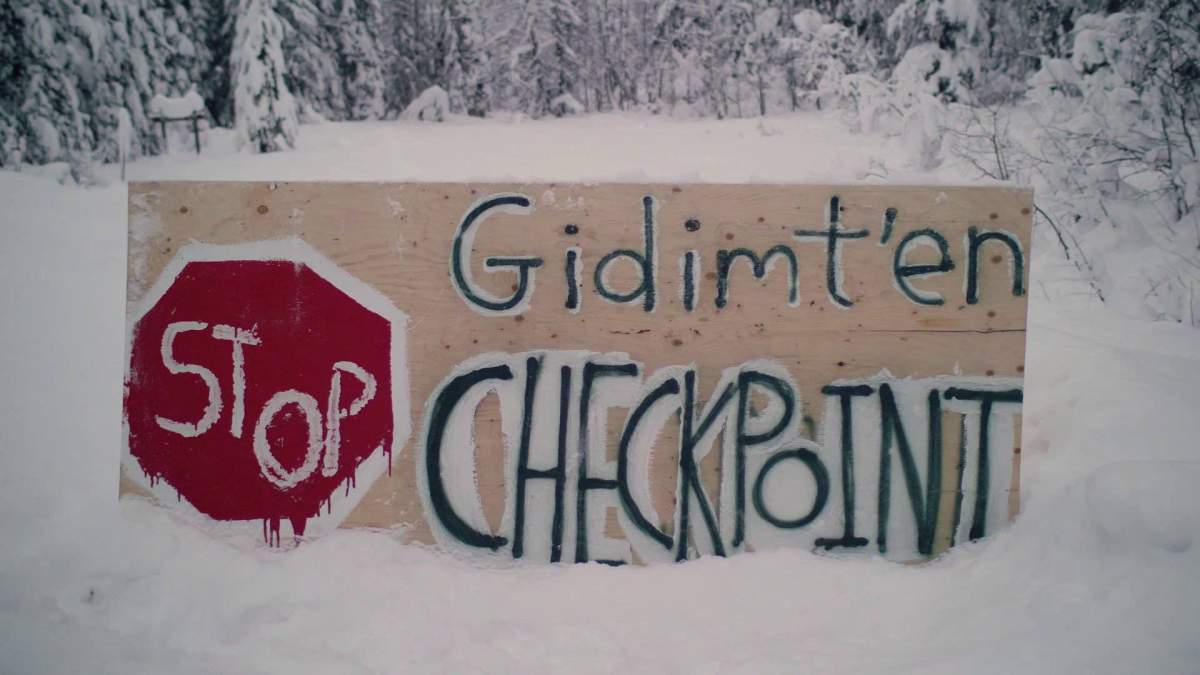 A sign for a blockade checkpoint by the Gidimt’en clan of the Wet’suwet’en First Nation is shown in this undated handout photo posted on the Wet’suwet’en Access Point on Gidumt’en Territory Facebook page.