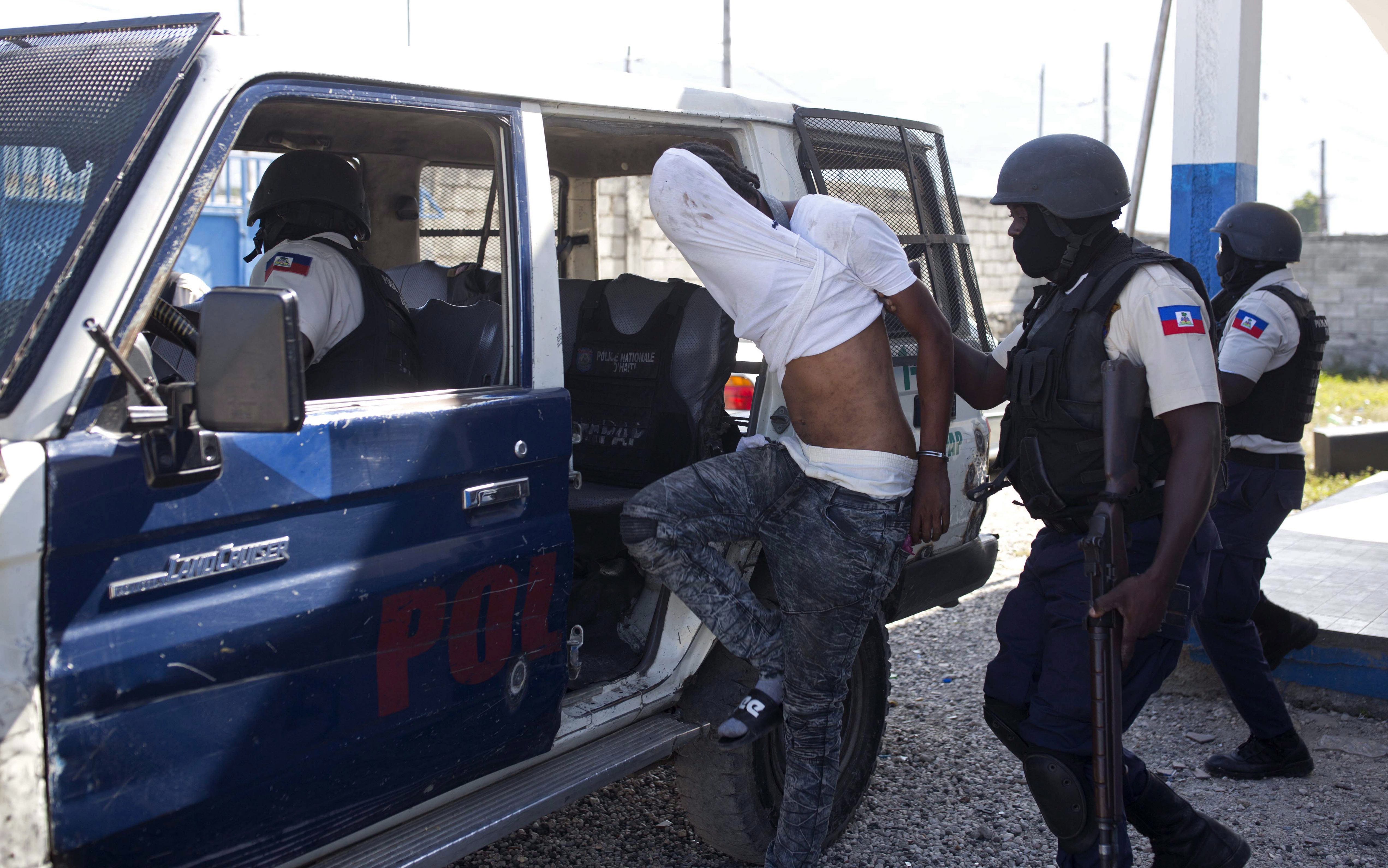 Witnesses: Men In Police Garb Massacred Civilians In Haiti - National ...