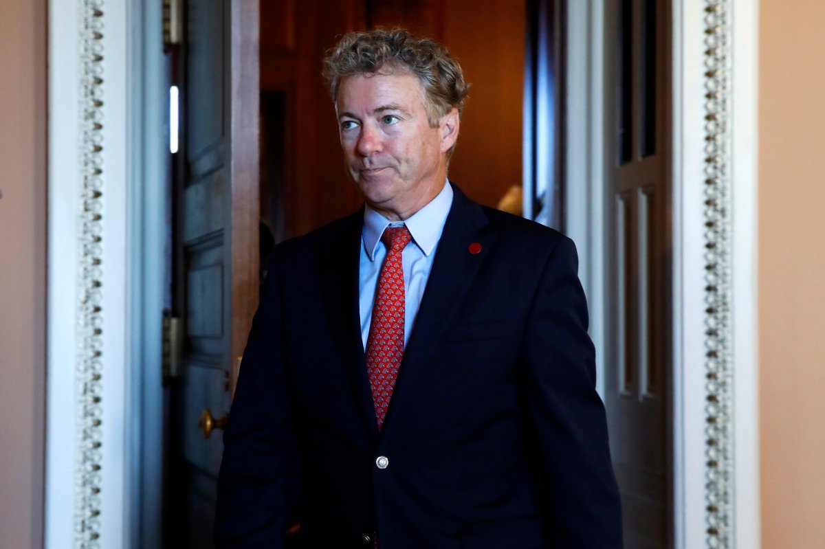 FILE- In this Sept. 26, 2018, file photo Sen. Rand Paul, R-Ky., leaves a meeting of Senate Republicans with Vice President Mike Pence on Capitol Hill in Washington. A court document says Paul is planning to undergo hernia surgery in Canada, a procedure it says stems from injuries he suffered when a neighbor attacked him while the lawmaker was doing yard work at his Kentucky home. 