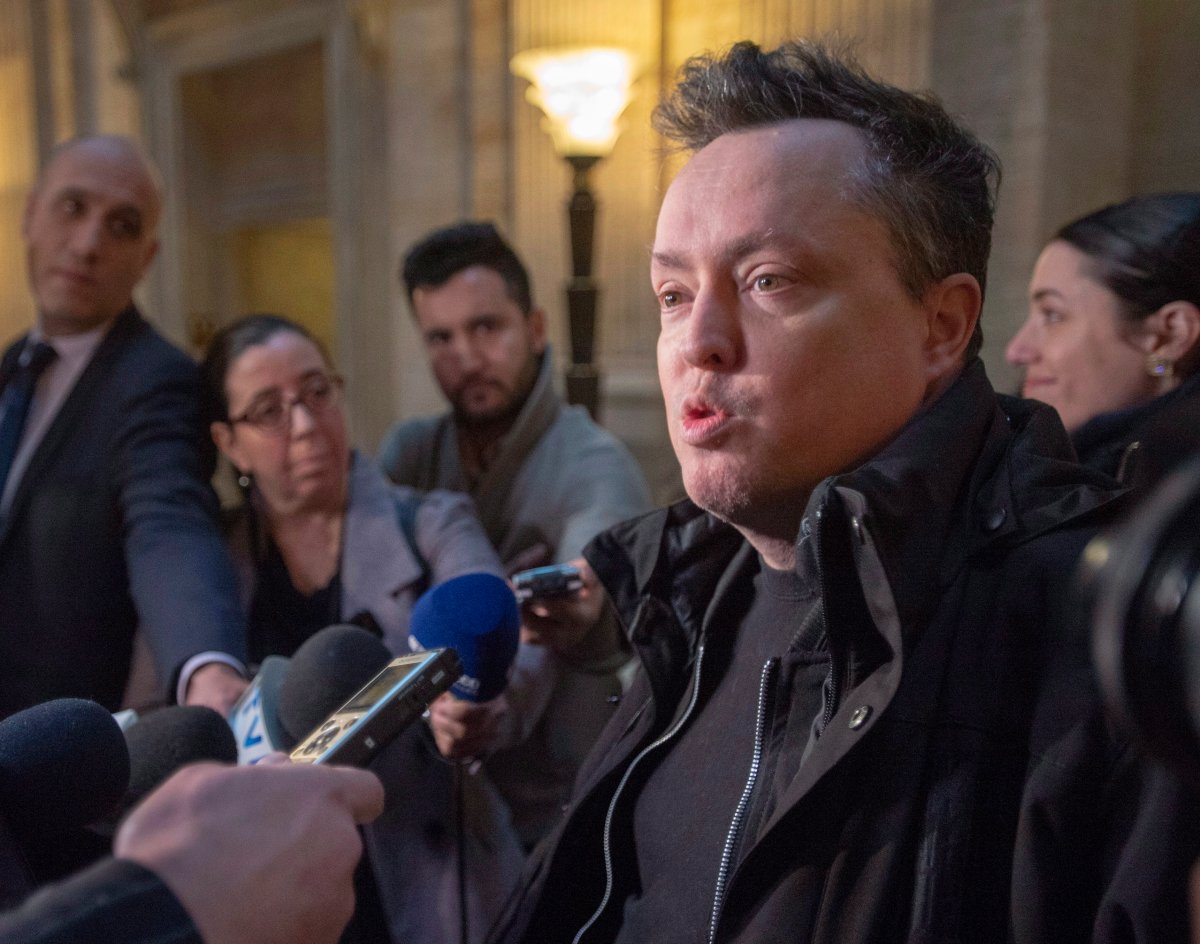 Comedian Mike Ward speaks to the media at the Quebec Appeal Court Wednesday, January 16, 2019 in Montreal. The Court is hearing arguments about whether Ward, who joked of drowning a disabled boy, Jeremy Gabriel, should have to pay damages to him and his family. 