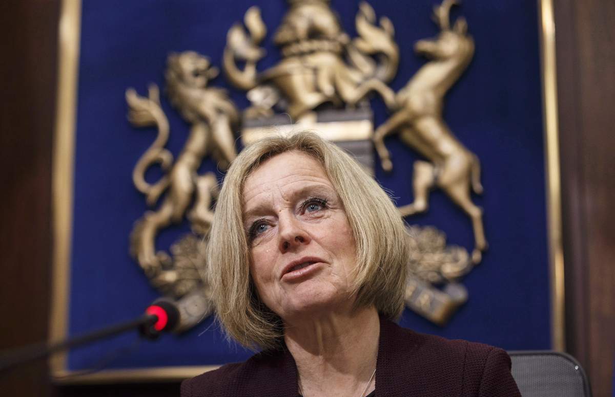Alberta Premier Rachel Notley speaks to cabinet members in Edmonton on December 3, 2018.