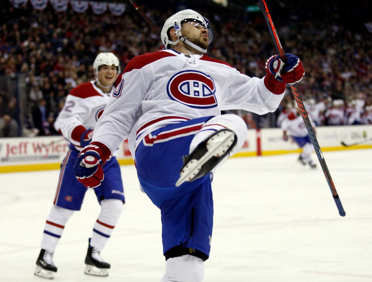 Montreal Canadiens forward Tomas Tatar, right, of Slovakia, celebrates his goal against the Columbus Blue Jackets in front of teammate forward Artturi Lehkonen, of Finland, during the first period of an NHL hockey game in Columbus, Ohio, Friday, Jan. 18, 2019. The Canadiens won 4-1.