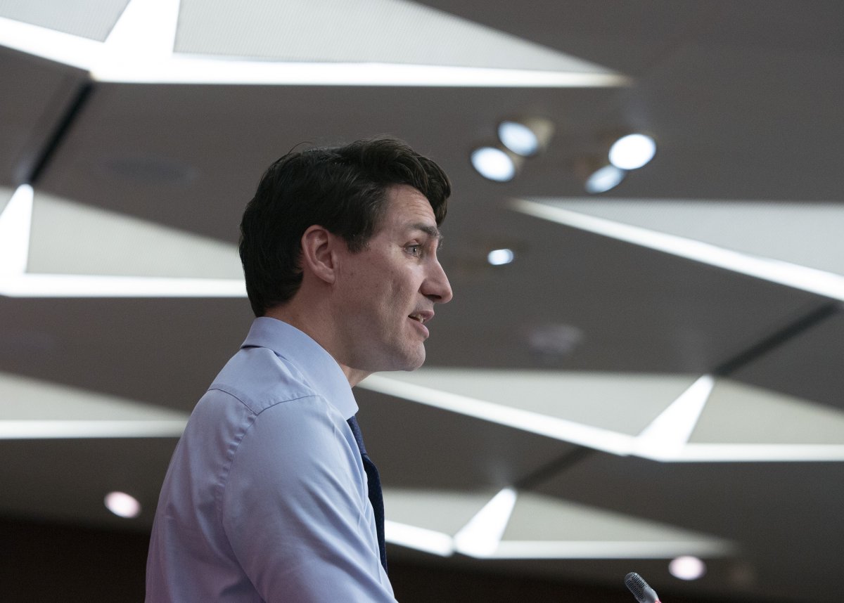 Prime Minister Justin Trudeau addresses a meeting with caucus on Parliament Hill in Ottawa on Sunday, Jan. 20, 2019. 