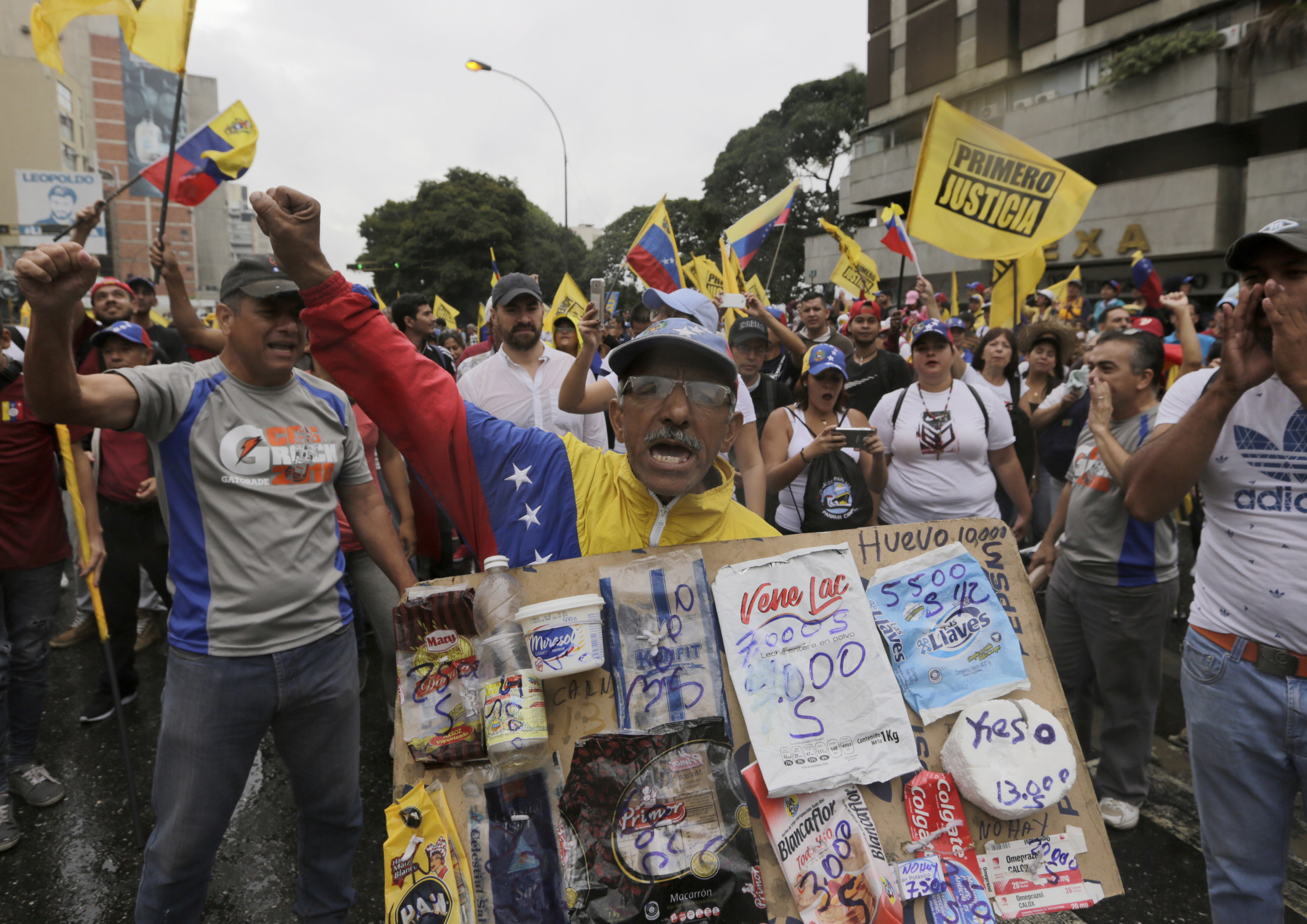 Opposition Protesters Take To The Streets In Venezuela Against ...